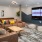 a room with couches and a tv