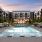a pool in a courtyard between buildings