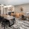 a lounge with a table and chairs