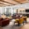 a large lounge with a large kitchen and glass doors