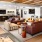 a lounge with a wood floor and couches