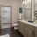 a bathroom with mirrors and sinks
