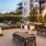 a courtyard with tables and chairs